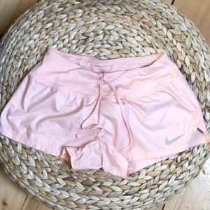 Pink low waisted athletic nike shorts with built in underwear